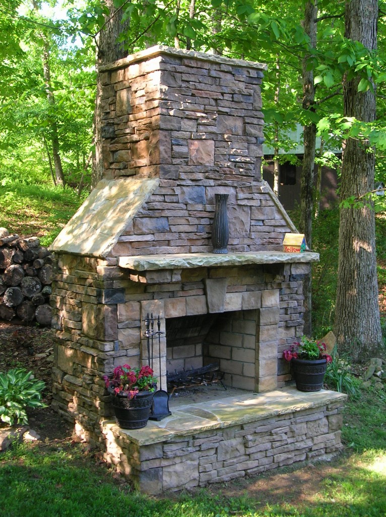 Build an outdoor fireplace with ContractorMen and enjoy the glow of a fire year round.